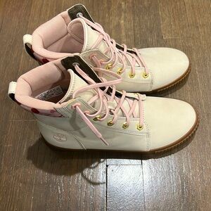 Timberland boots with cherry blossom accents.